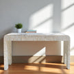 Chiseled bone inlay console table with curved edges