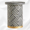 Designer black side table with optical bone inlay pattern