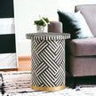 Optical bone inlay round side table in black resin