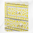 Cassettiera con 4 cassetti e design geometrico a stella con intarsio in osso giallo