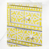 Cassettiera con 4 cassetti e design geometrico a stella con intarsio in osso giallo
