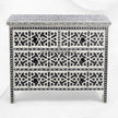 Commode à 4 tiroirs avec incrustation d'os noirs, motif géométrique en forme d'étoile