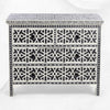 Commode à 4 tiroirs avec incrustation d'os noirs, motif géométrique en forme d'étoile
