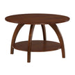 Arlo round solid wood coffee table in brown with four arched legs and a lower shelf, on a white background