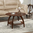 Arlo arched leg coffee table in front of a beige sofa in a living room