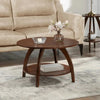 Arlo arched leg coffee table in front of a beige sofa in a living room
