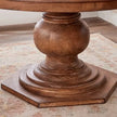 Bastia Round Pedestal Solid Wood Dining Table turned pedestal and hexagonal base