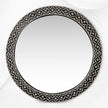 Espejo redondo de hueso con relieve floral negro