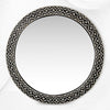 Espejo redondo de hueso con relieve floral negro