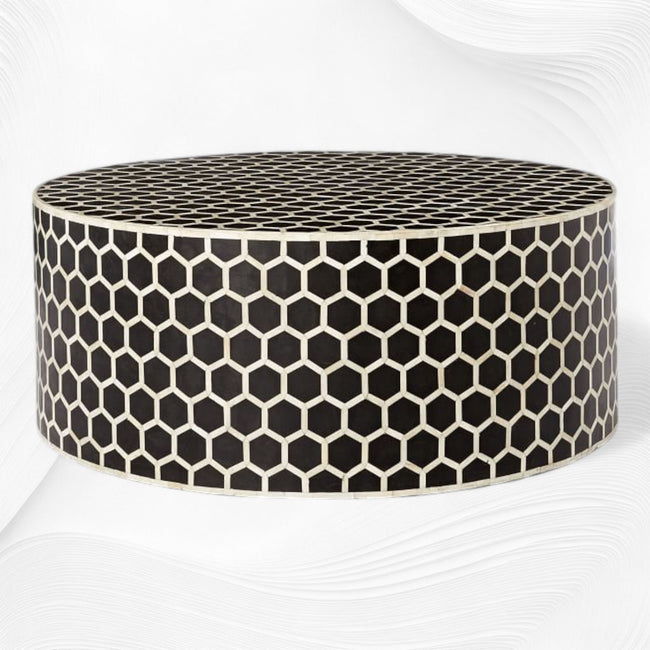 Mesa de centro redonda con incrustaciones de hueso en forma de panal negro