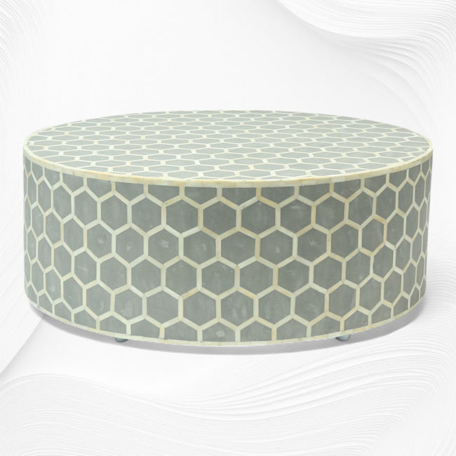 Mesa de centro redonda con incrustaciones de hueso gris panal