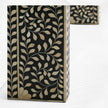 Mesa consola floral con incrustaciones de hueso negra