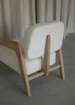 Calla Boucle Upholstered Lounge Armchair side angle