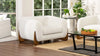 Cocoon Boucle Wooden Base Armchair in a living room
