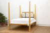 Colonial Bleached Lattice Four Poster Bed with white bedding