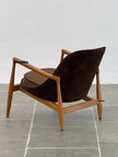Elsa Wooden Lounge Armchair with Ottoman angled view