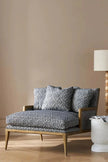 Fiora Upholstered Wooden Chaise Settee in a living room