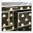 Cassettiera con 4 cassetti con intarsio in osso, design Arrow in nero
