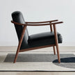 Fjord Upholstered Wooden Lounge Armchair in black fabric