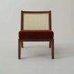 Kora Cane Back Wooden Lounge Chair front view with rust seat