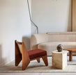 Kora Cane Back Wooden Lounge Chair in a living room