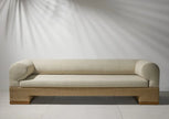 Nest Woven Base Upholstered Sofa in a room
