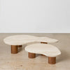 Nova low coffee tables in small and large sizes with curved organic tops on cylindrical legs