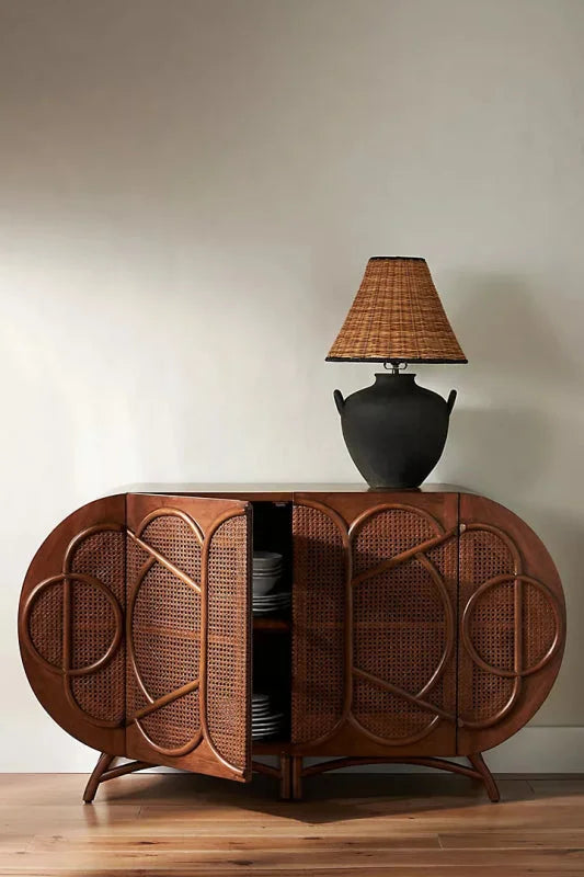 Ofelia Rounded Cane Door Sideboard styled with a lamp