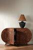 Ofelia Rounded Cane Door Sideboard styled with a lamp