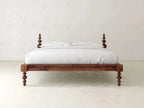 Ophira Turned Two Poster Solid Wood Platform Bed in a walnut finish
