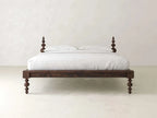 Ophira Turned Two Poster Solid Wood Platform Bed in a dark brown finish