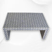 Table centrale de citation avec incrustation d'os, gris