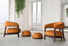 Ronde Curved Back Lounge Armchair tan pair with poufs