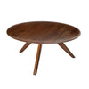 Sora brown round coffee table seen from above, showing the wide wooden top
