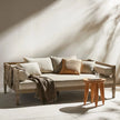 Spindle Side Wooden Arm Sofa in a lounge setting