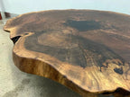 Close-up of the natural live edge on the Terra slab coffee table
