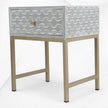Comodino design onda marina con intarsio in osso grigio chiaro