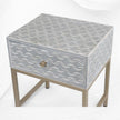 Comodino design onda marina con intarsio in osso grigio chiaro